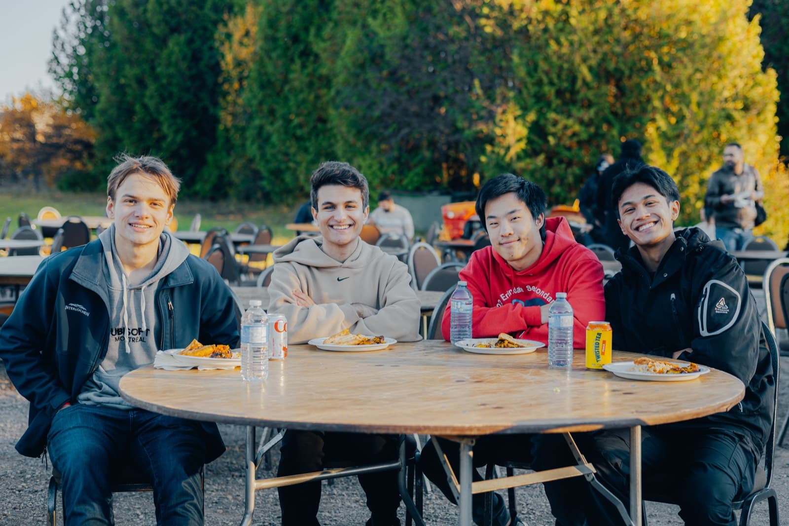 Friends at a table at the SPUR BBQ festival